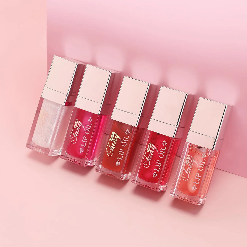 Mint lip gloss and lipstick set showing five bright colour options with lip essence oil