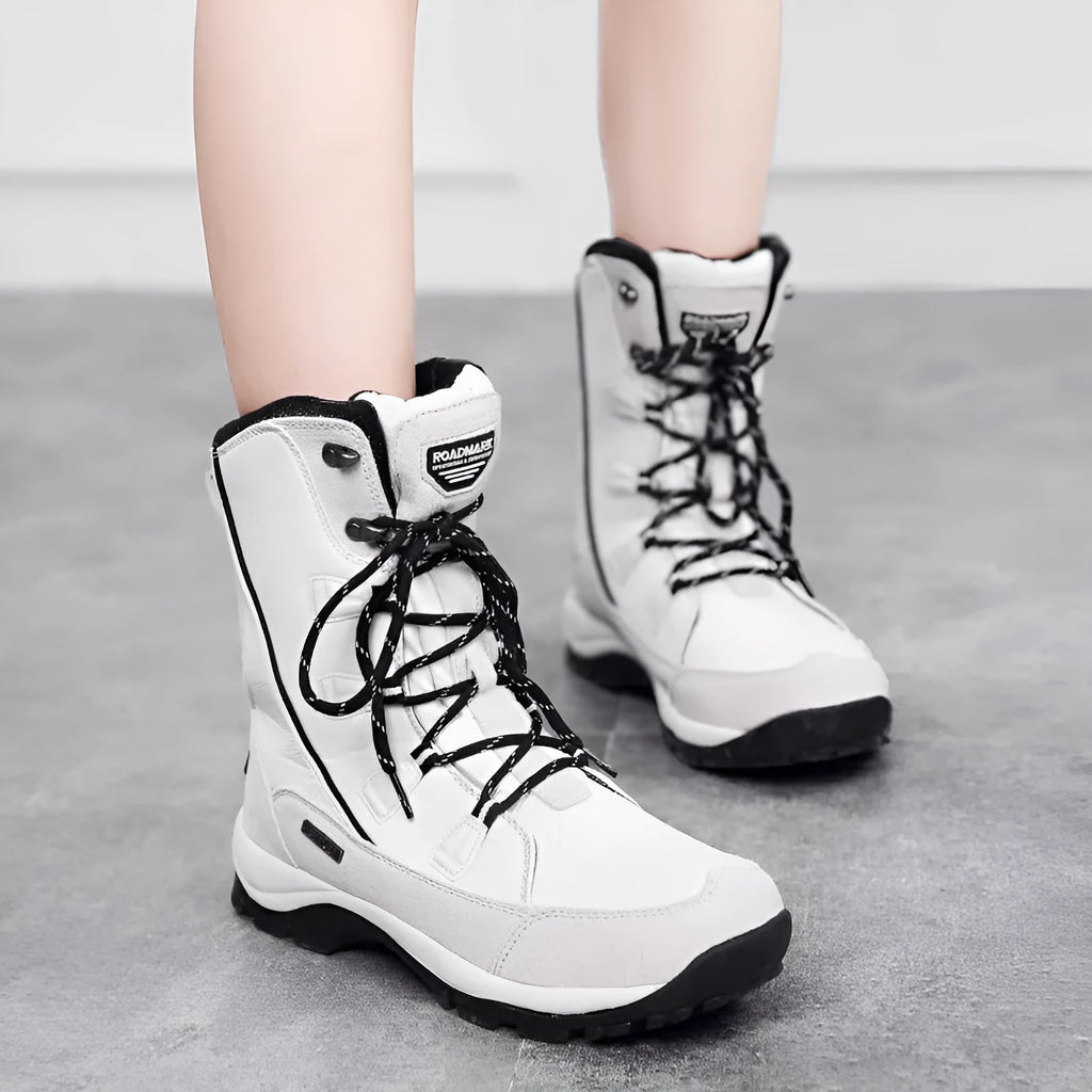 Women's mid-calf thermal snow boots in genuine leather with round toe and non-slip rubber sole