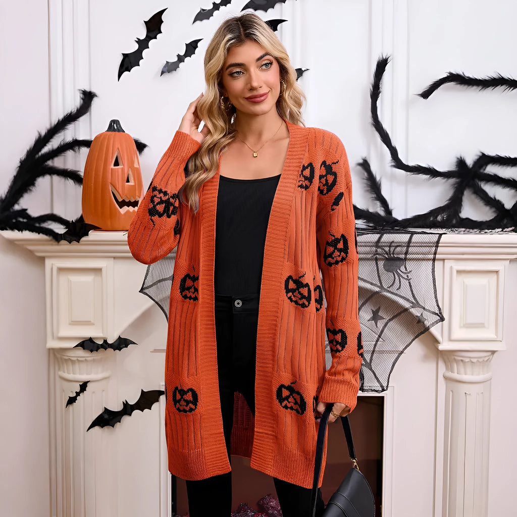 Women's black Halloween cardigan with orange pumpkin head jacquard pattern, straight cut with regular sleeves.