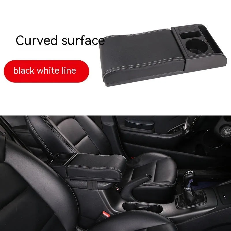 Universal plastic car armrest cover in black with red cord stitching on a centre console