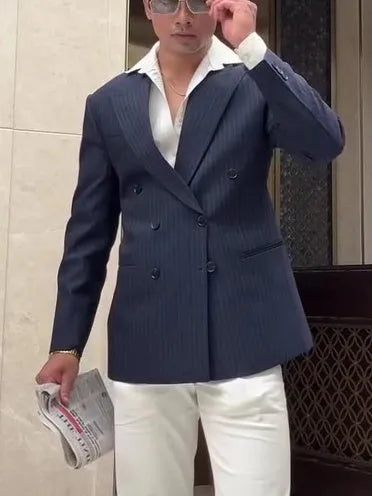 Men's striped double-breasted polyester blazer on a hanger, showing regular fit and length.