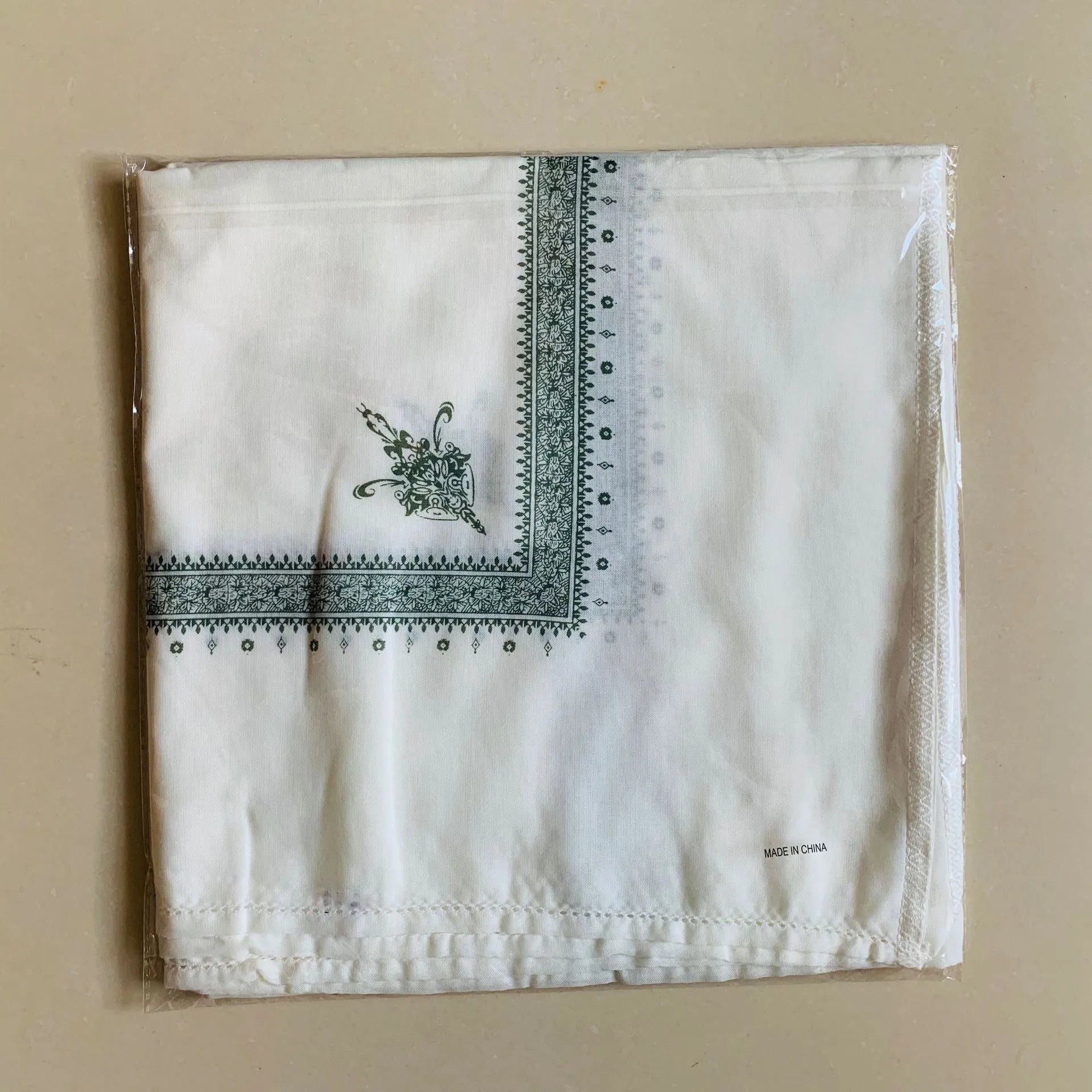 Printed square polyester scarf in a selection of colours, shown flat to display its 138x138 cm dimensions.