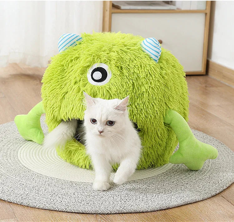 Round fluffy cat bed with plush fabric and non-slip base in three size options