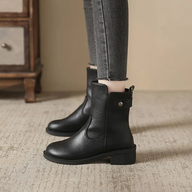 Women's black low heel ankle boots with side zip and round toe design