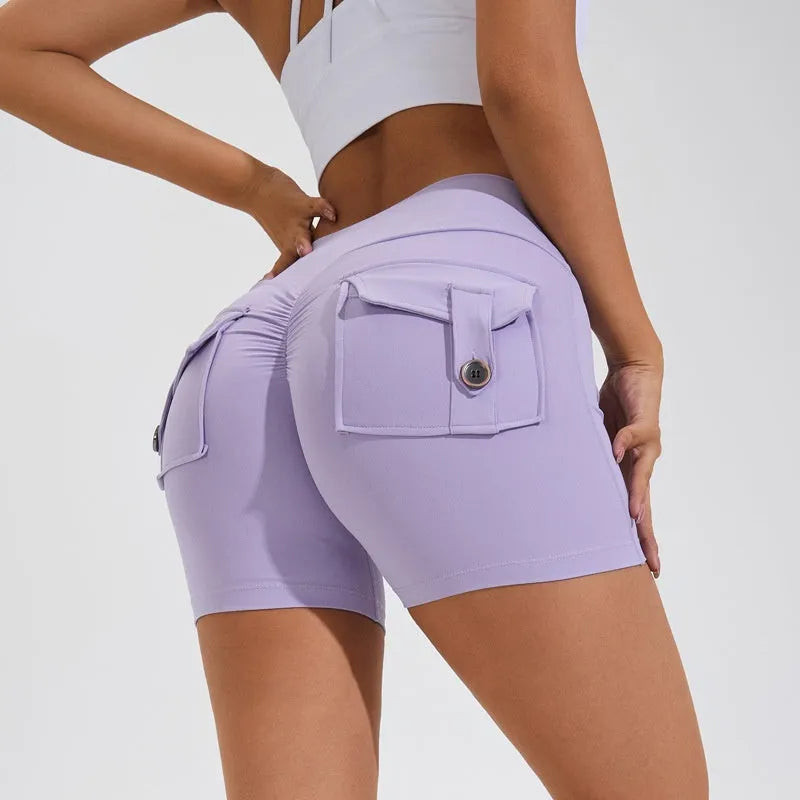 Women's high waist hip lifting shorts with pockets in various colours for fitness activities