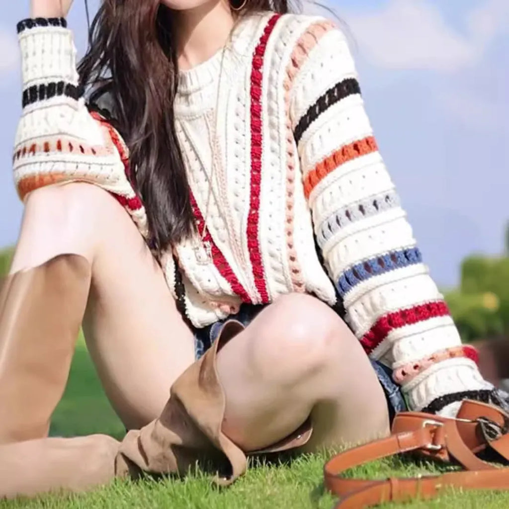 Rainbow striped sweater with batwing sleeves in loose fitting retro casual style