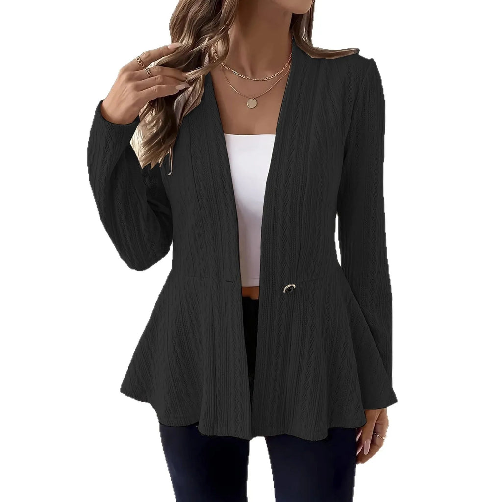 Women's apricot knitted cardigan with one button and jacquard pattern on a hanger.