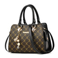Women's geometric pattern messenger bag in PU material with multiple internal compartments and zipper closure