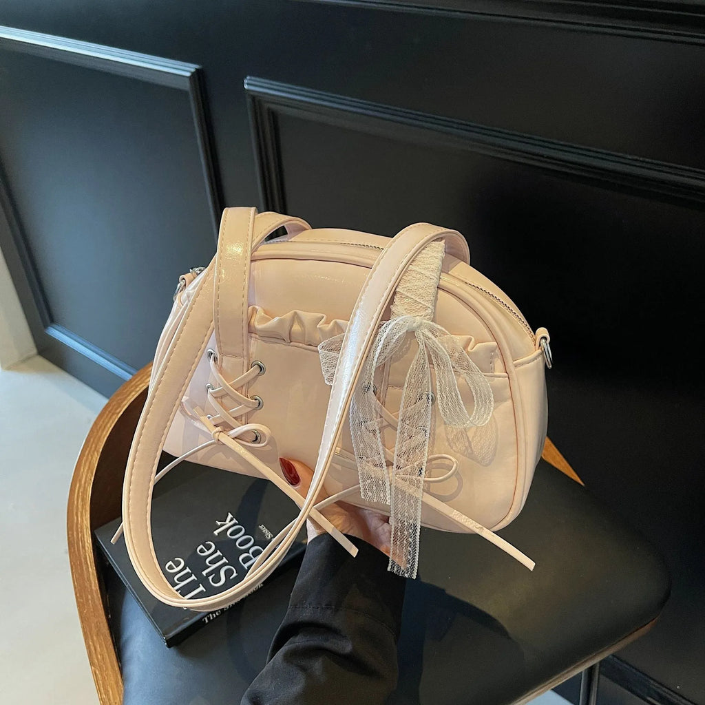 Women's bandage bow PU leather handbag with shoulder strap and internal phone compartment
