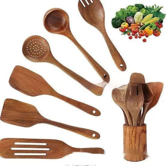 7-piece wooden kitchen utensil set showing spoon, spatula and soup spoon on wooden surface