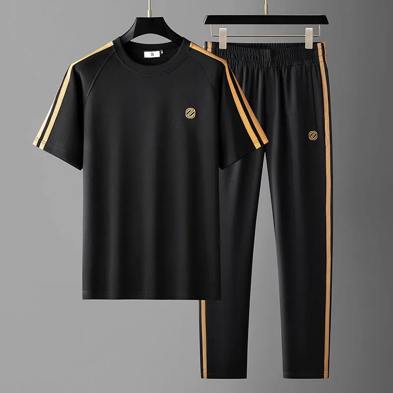 Men's blue ironing-free short sleeve polyester sports suit consisting of a top and pants