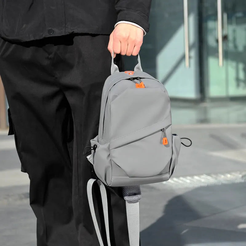Black mens waterproof polyester crossbody bag with single shoulder strap in casual style