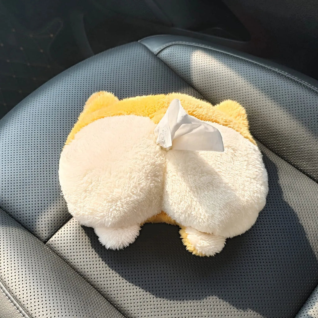 Yellow corgi butt shaped soft polyester car tissue box cover hanging on a sun visor.