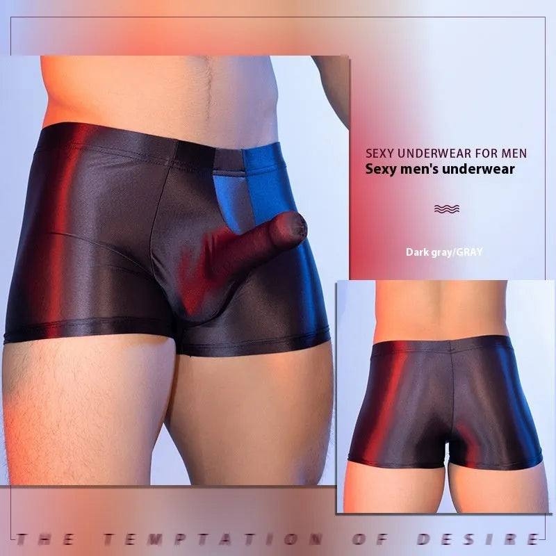 Red men's boxer shorts with elephant nose animal year design, showing mid-waist and seamless construction.