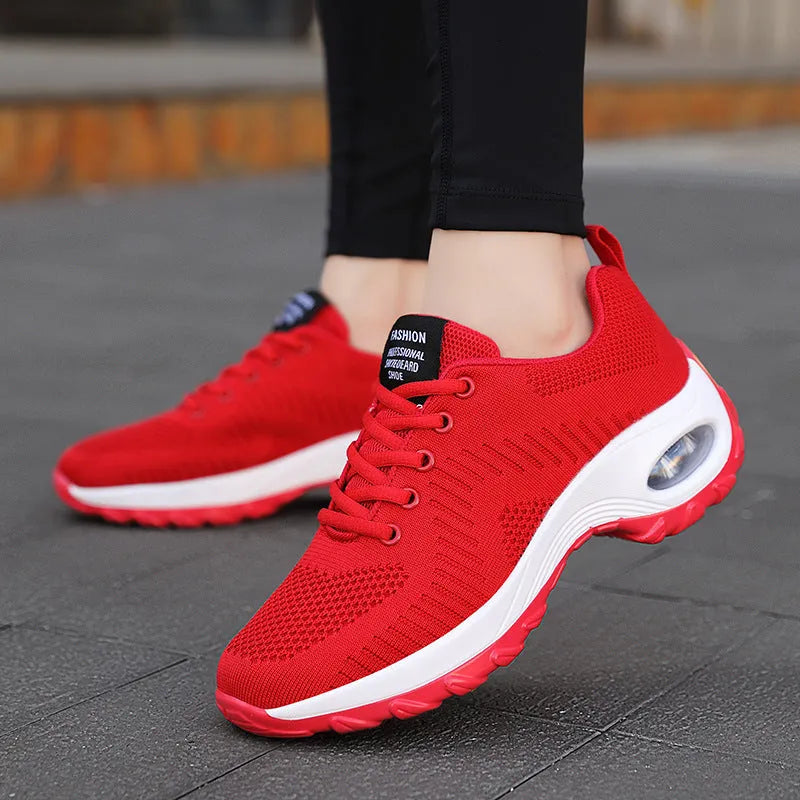 Women's black mesh sneakers with round toe and front lace-up design