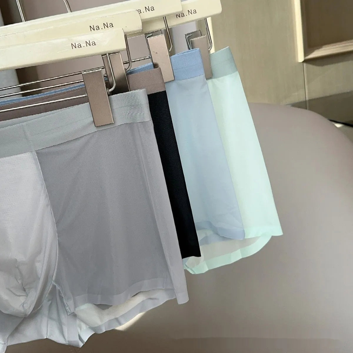 Ultra-thin nude colour men's boxer shorts with seamless design and honeycomb crotch detail.
