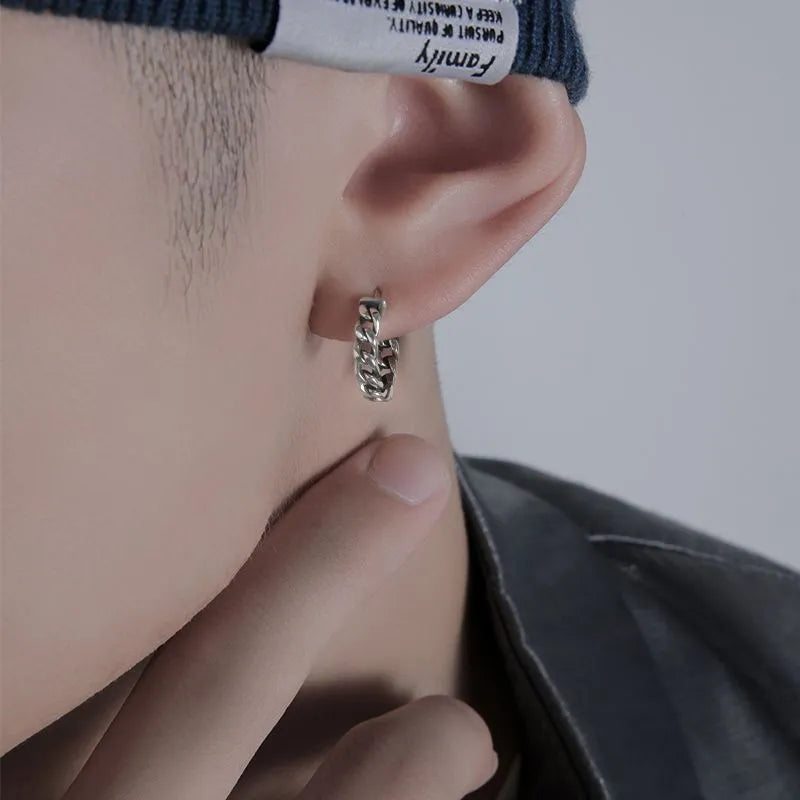 Silver geometric copper stud earrings for men in 10mm and 14mm sizes, shown singly and as a pair.