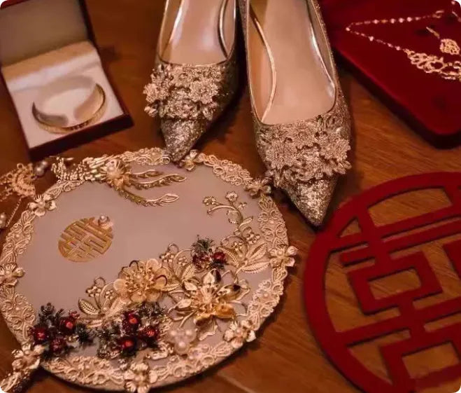 Champagne coloured wedding shoes with crystal flower pattern and pointed toe