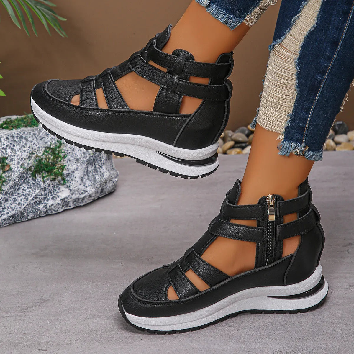 Women's black hollow-out platform sandals with round toe and Velcro strap fastening.