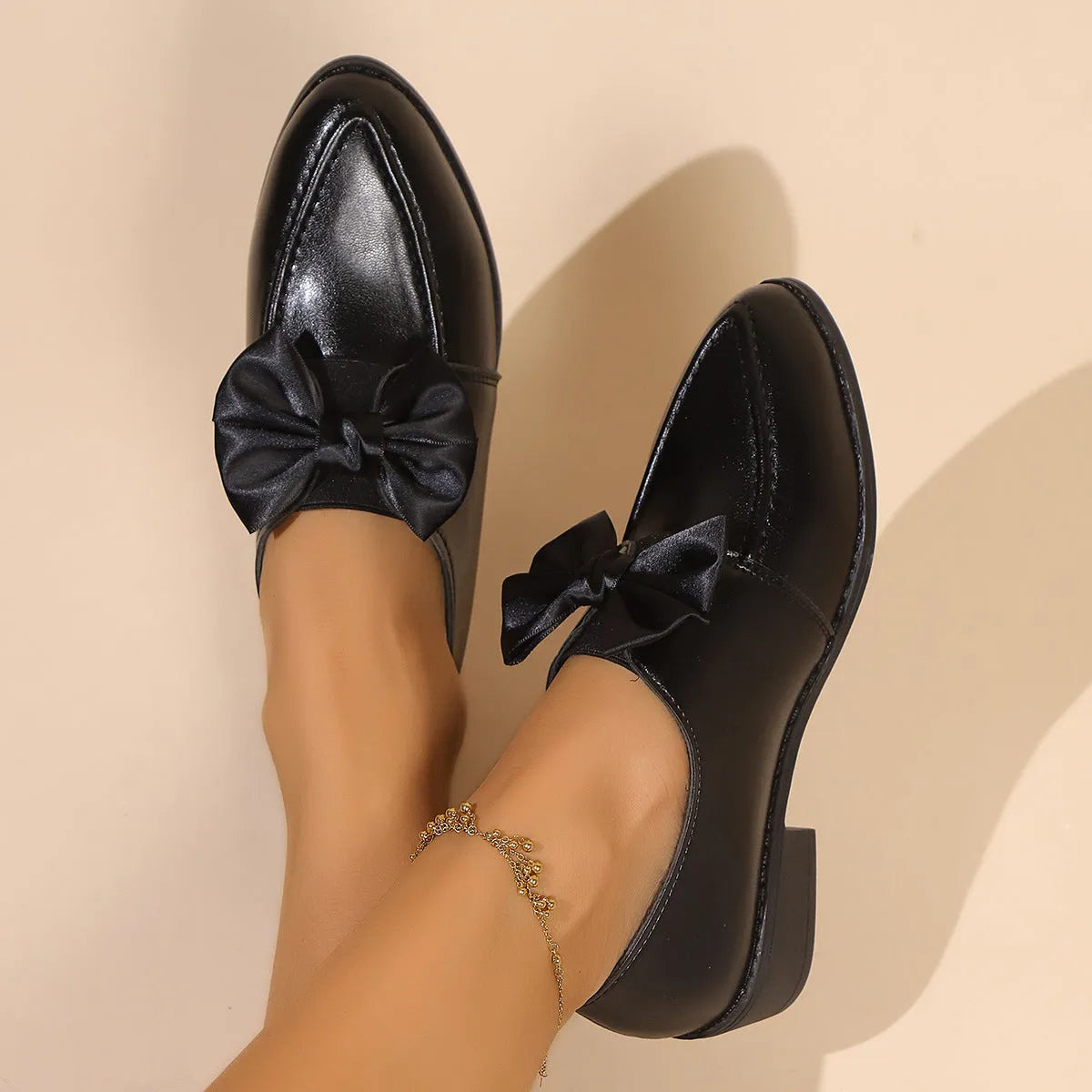 Women's flat loafers with a decorative bow, available in big bow or small bowknot styles.
