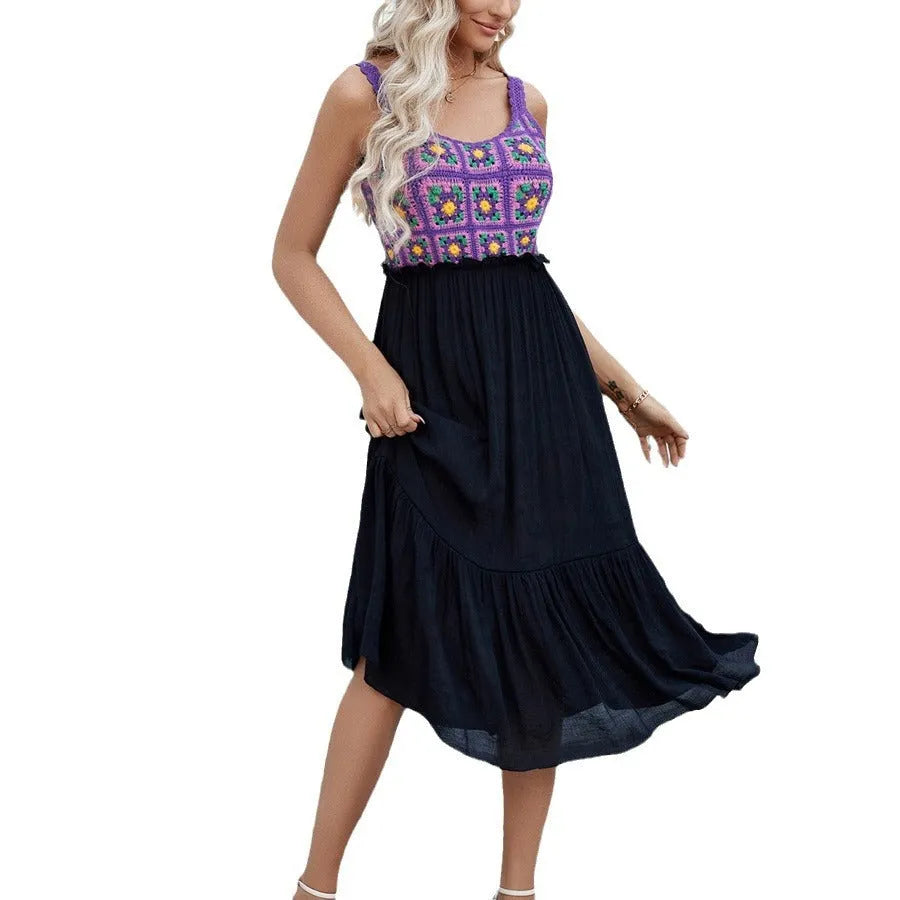 Purple sleeveless dress with floral embroidery, shown on a hanger