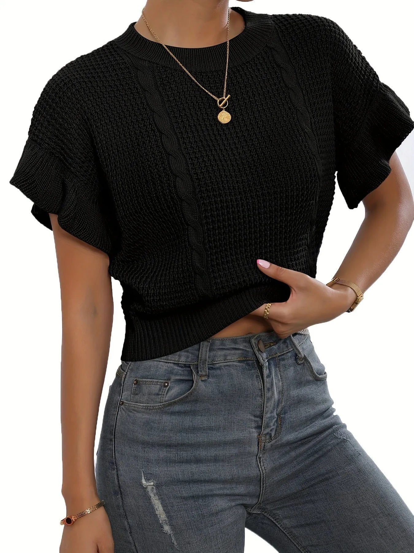 Knitted pullover sweater with twisted string pattern and ruffled short sleeves in loose fit