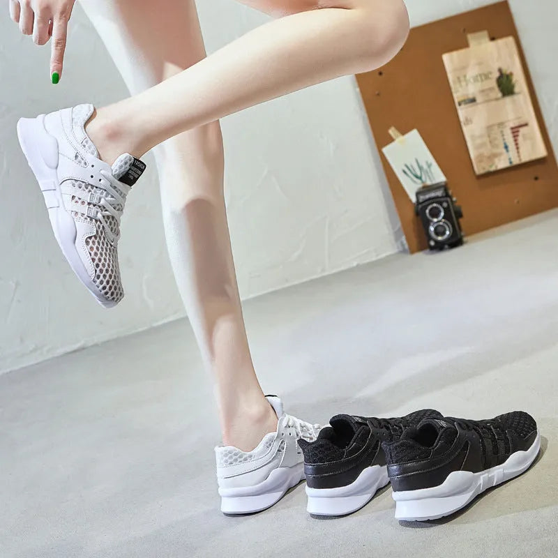 Breathable mesh sneakers with hollow-out design and EVA sole in black and white colour options