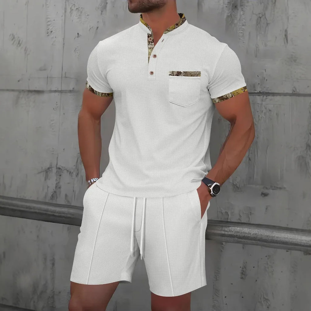 Men's grey waffle texture zipper polo short sleeve top with matching shorts laid flat