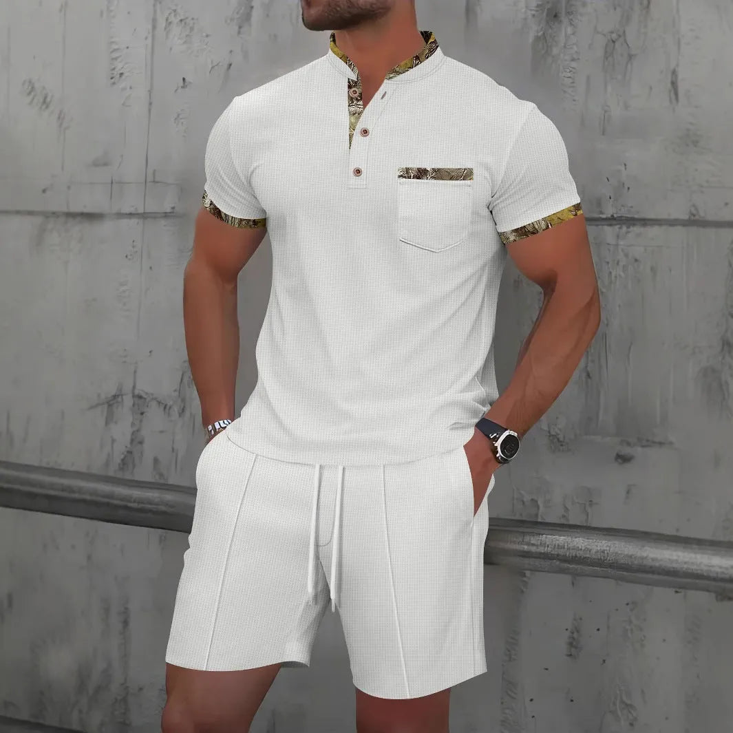 Men's grey waffle texture zipper polo short sleeve top with matching shorts laid flat