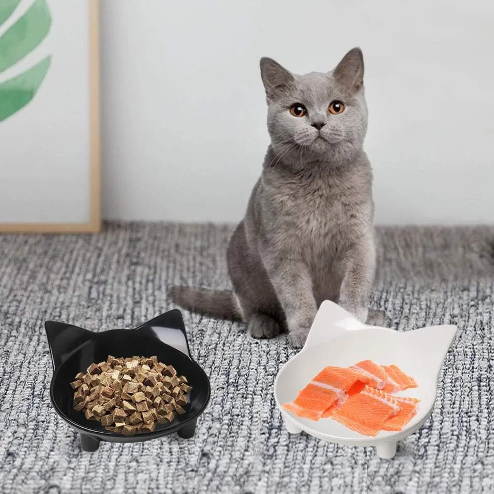 Shallow black melamine cat food bowl with anti-skid rubber base on wooden floor