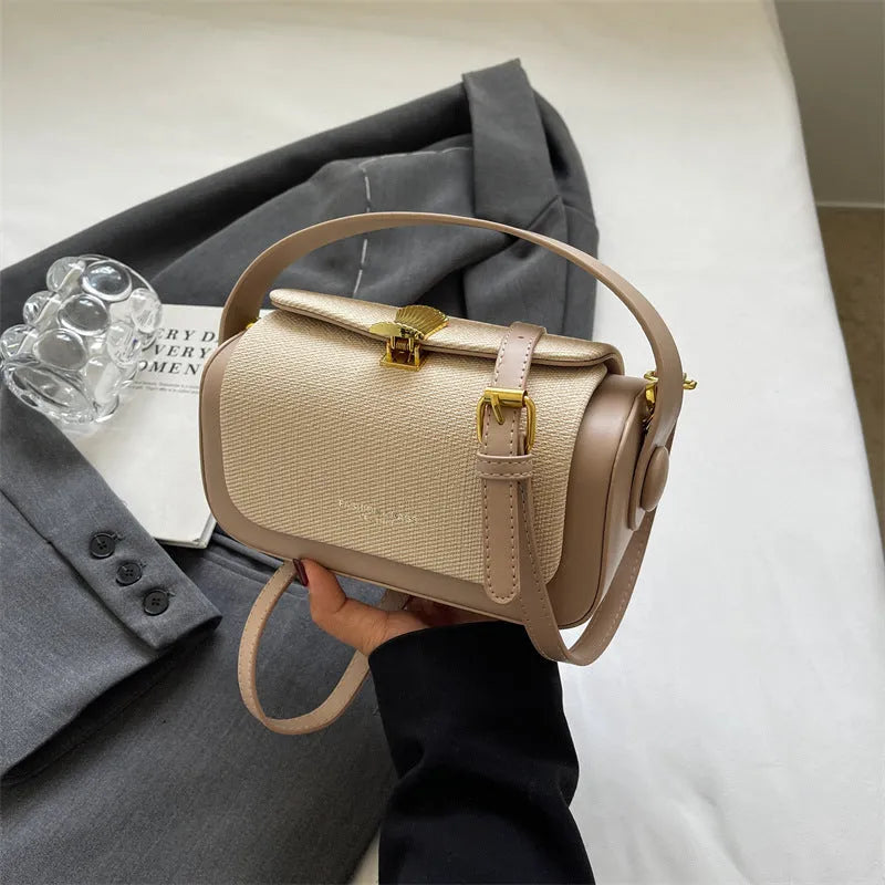 Women's PU leather crossbody messenger bag in a horizontal square shape with a single strap.