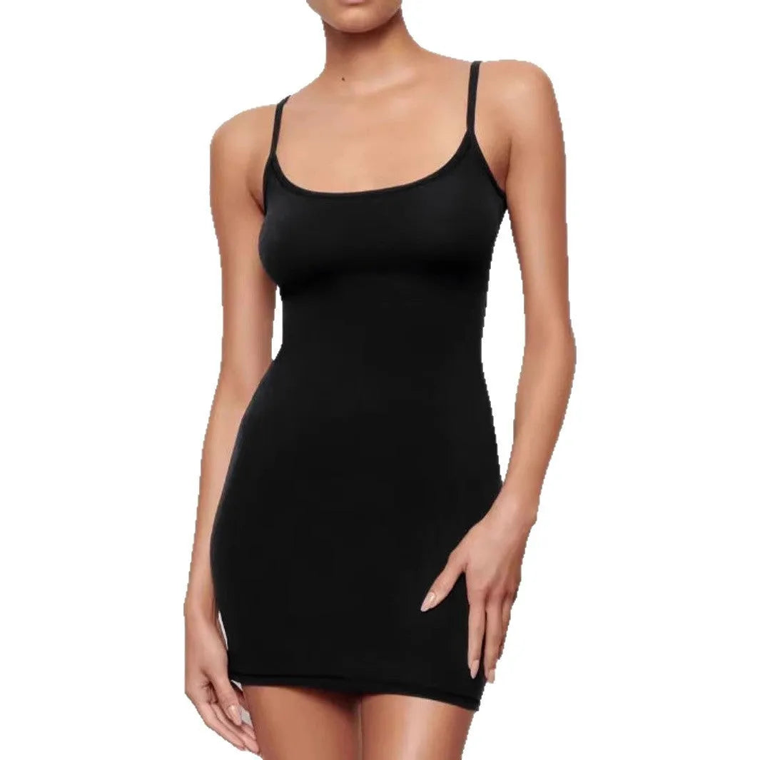Black sleeveless sling-style sheath dress with a short skirt on a hanger.