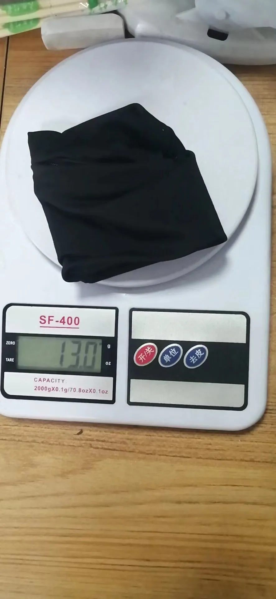 Wrist bag armband sleeve for mobile phone with adjustable strap, shown in packaging