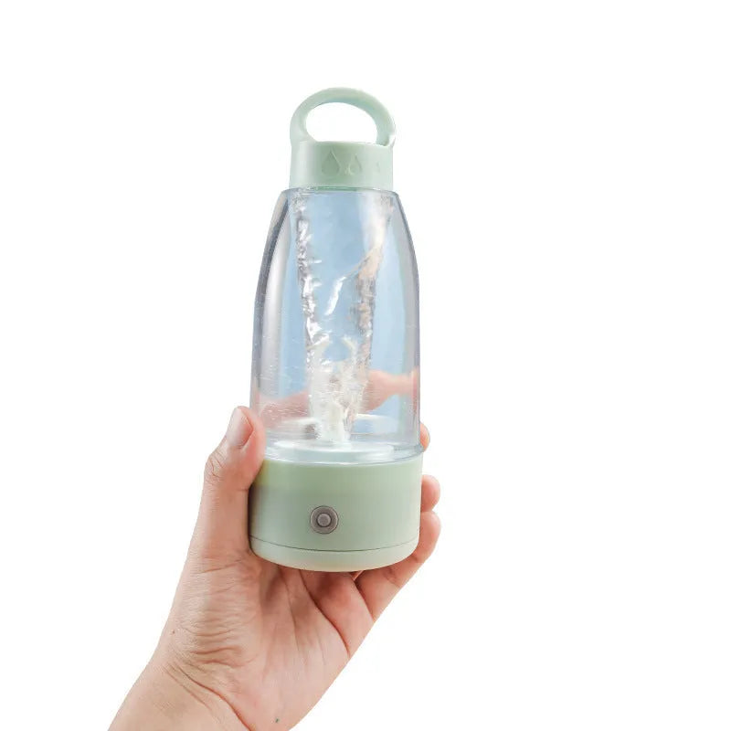 Automatic electric shaker bottle with handle, USB charging port, in green, pink, or white colour options.