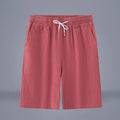 Cotton linen cropped summer trousers in a solid colour with a drawstring waist, shown in a casual Chinese-style fit.