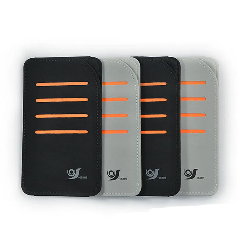 Grey car dashboard storage bag with 4 card slots and clear plastic window mounted on vehicle windscreen