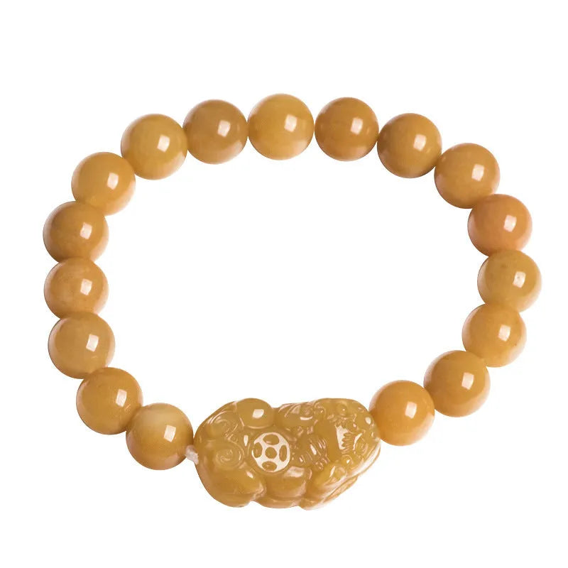 Hand-carved golden thread jade money coin bracelet with jade beads in two size options.