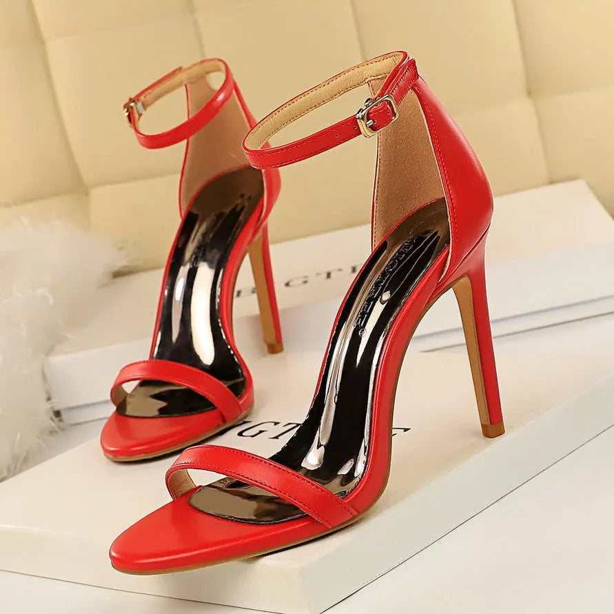 Open-toe ankle-strap high heels in artificial PU with buckle fastening