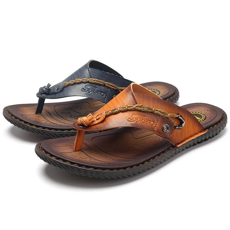 Men's dark blue herringbone pattern outdoor slippers with a leather lining and rubber sole.