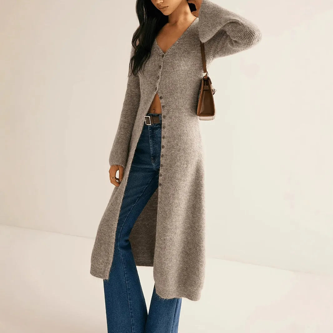 Khaki coloured long sleeve button-up cardigan coat in a French retro style.