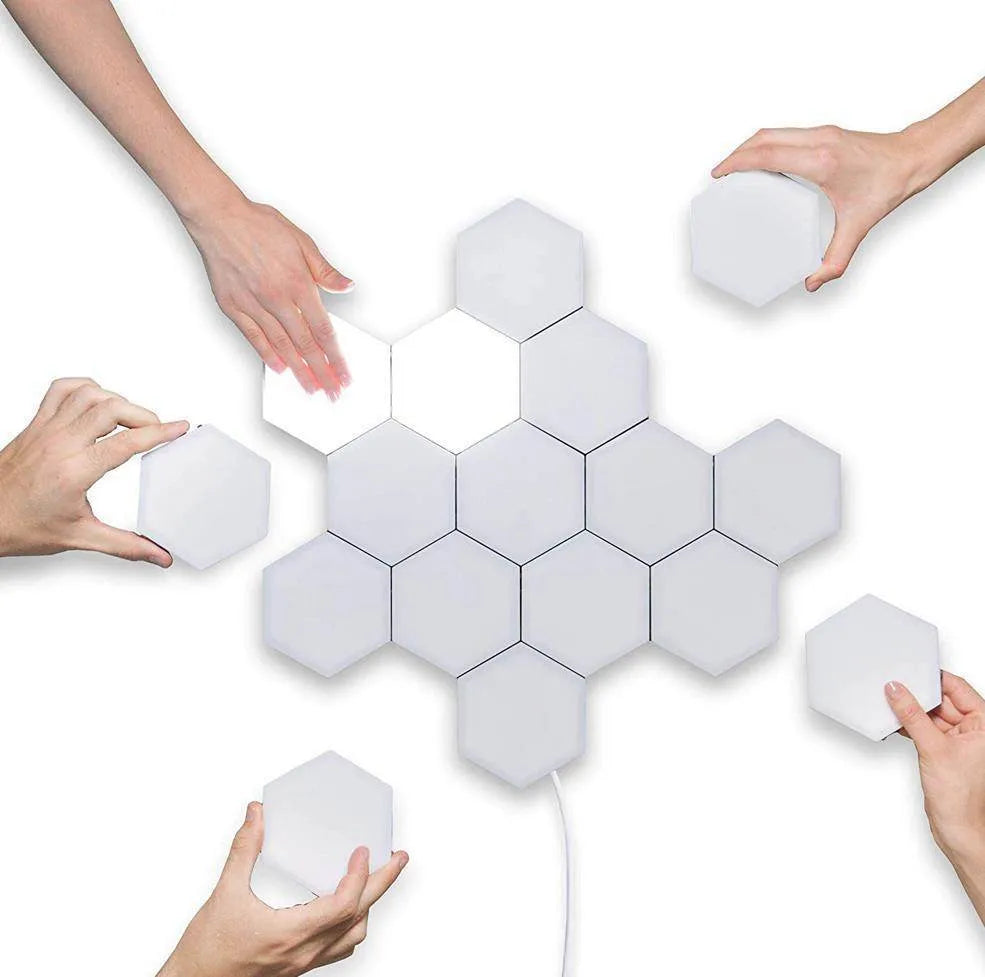 Helios modular honeycomb touch-sensitive wall lamp panels assembled in a geometric pattern on a wall.