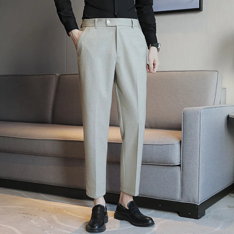Straight fit brown corduroy trousers with elastic waistband on hanger