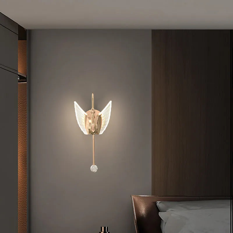 Modern gold swan-shaped wall lamp with acrylic shade and iron body for bedside lighting