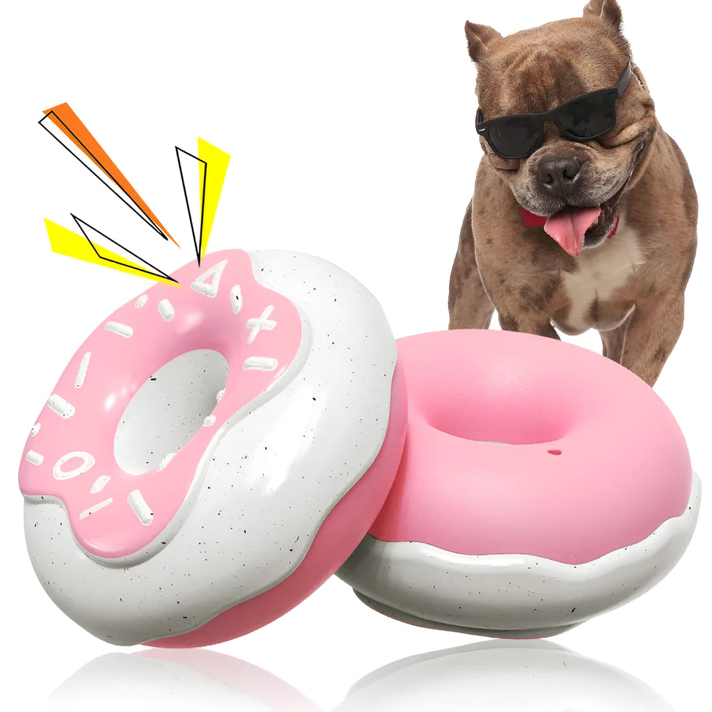Donut-shaped TPR dog chew toy for molar teeth cleaning in chocolate, pink, or yellow colours.