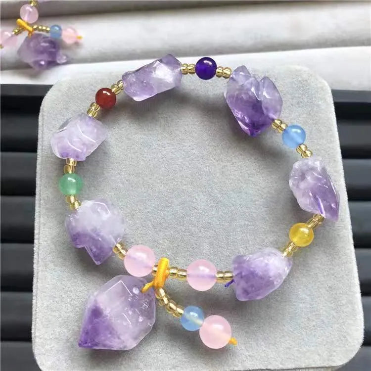 Natural shaped amethyst bracelet with fu character decoration for women's jewellery and gifting.