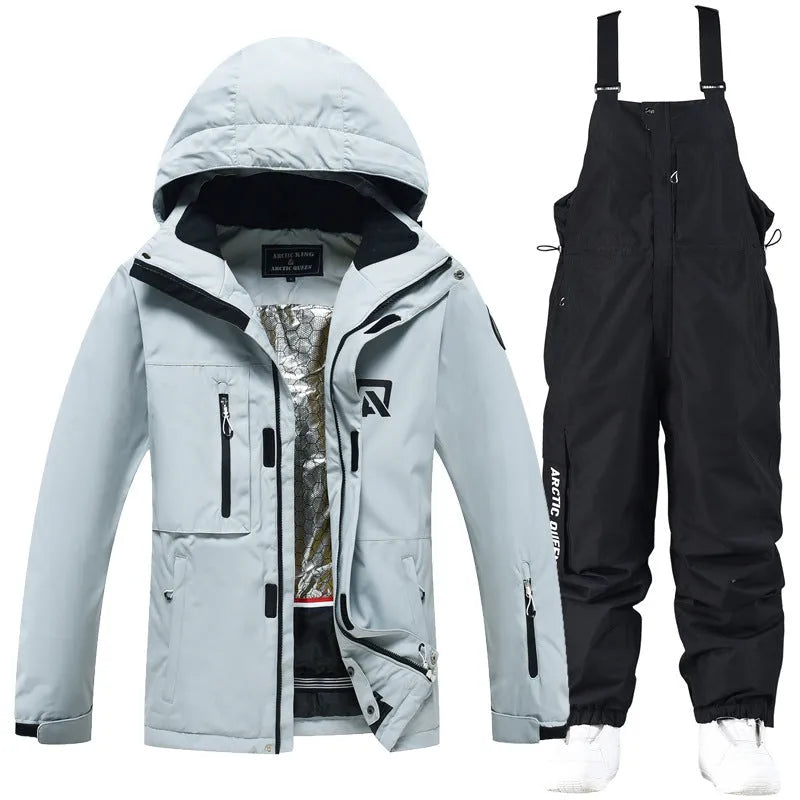 Blue and black unisex winter ski suit jacket and pants for snow sports.