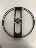 Round metal wall clock with 50cm diameter face in black or gold finish.