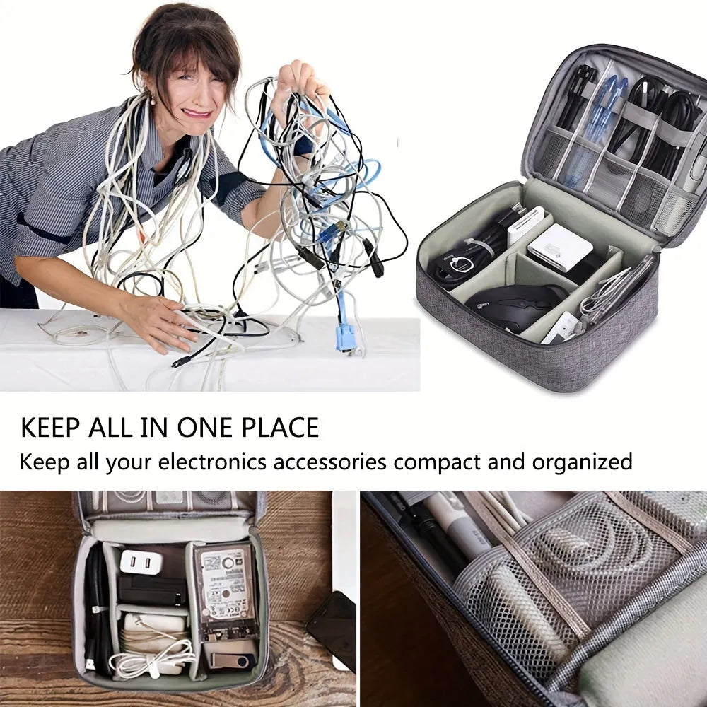 Black waterproof electronic cable organiser bag open to show mesh pockets, elastic loops, and removable padded dividers.