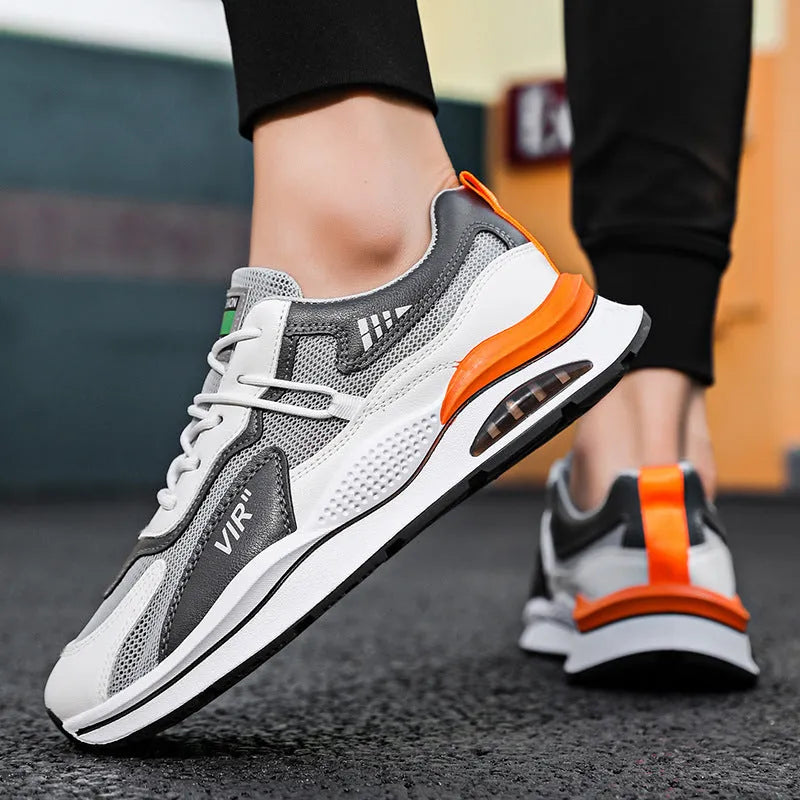 Men's grey and black breathable mesh casual running shoes with a round toe and lightweight EVA sole.