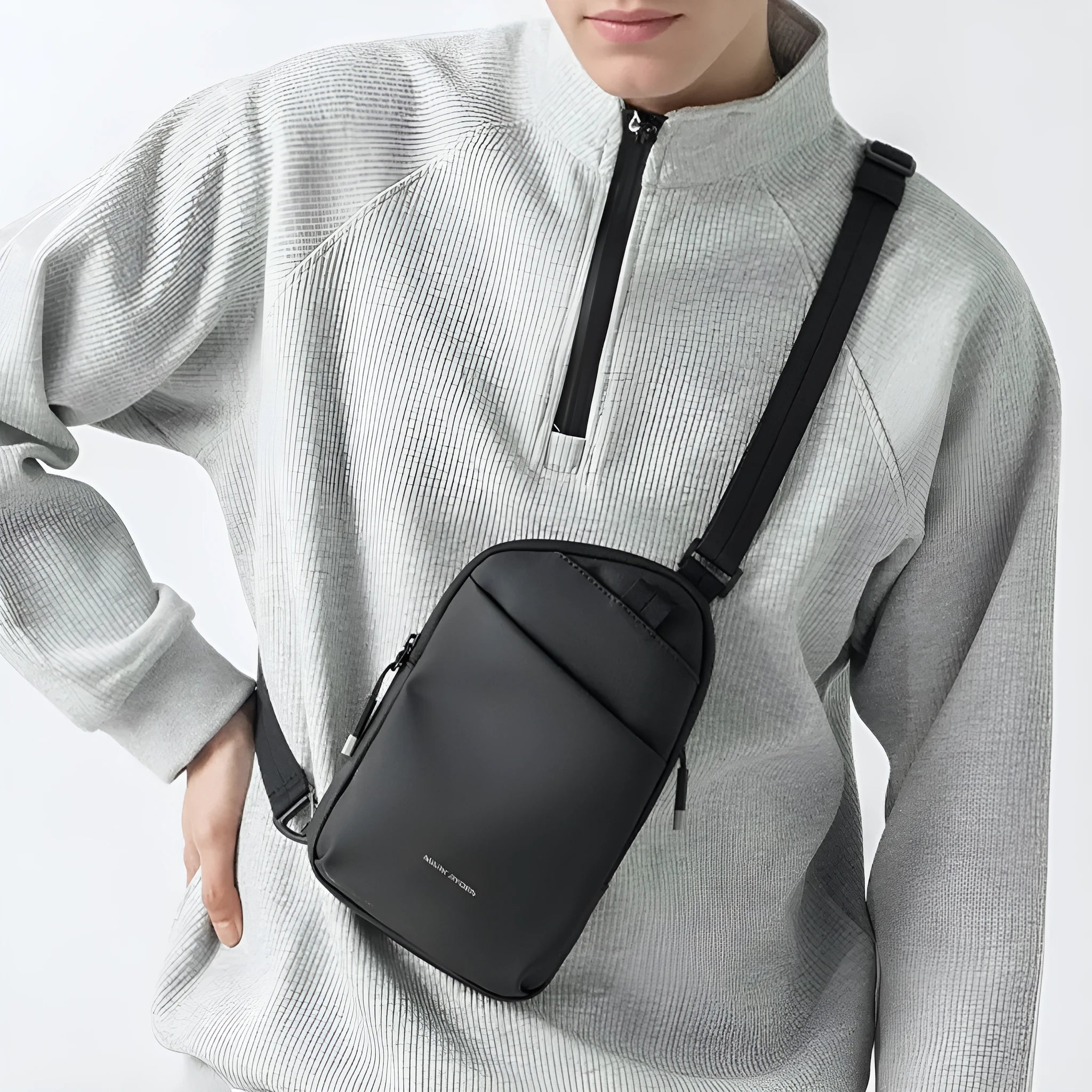 Men's black Oxford cloth crossbody bag with simple design showing sewing thread detailing and wear-resistant construction